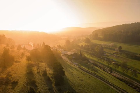 Extensive panorama of fields and forests in the soft light of sunset, Deufringen, Aidlingen,