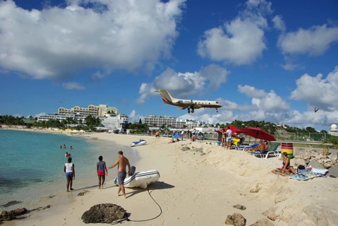 Caribbean, Guadeloupe, landing approach, airplane, passenger plane, beach, people, tourists