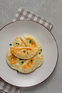 Pierogi, a traditional dish of Polish cuisine, dumplings, top view, close-up, no people
