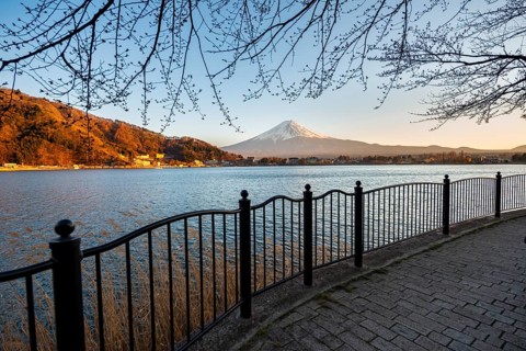 Kawaguchi Lake waterfront, view of Mount Fuji volcano at sunset, Yamanashi Prefecture, Japan