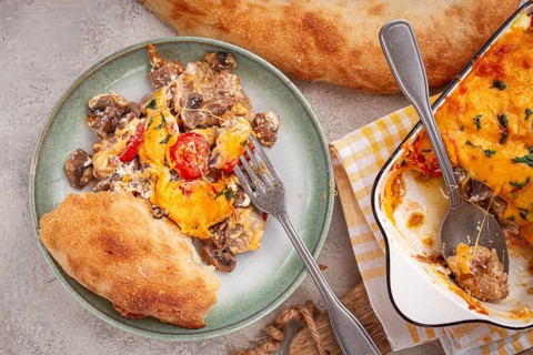 Madame Bovary's Georgian dish, chicken fillet with mushrooms, tomatoes and cheese, baked in a mold