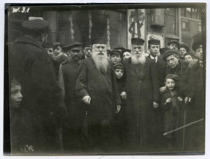 Rabbi, young men, Poland, Krakow, Shtetl, Jewish, A group of elderly men with beards standing on