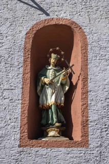 Statue of St. Nepomuk at a town house in the historic old town of Rottweil, Rottweil district,