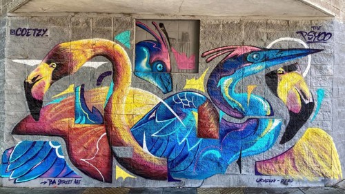 Street art in Buenos Aires with colorful flamingos and herons, Buenos Aires, Argentina