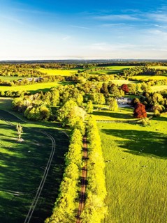 Fields and Farms over Horsebridge nad Stockbridge from a drone, Hampshire, England, United Kingdom