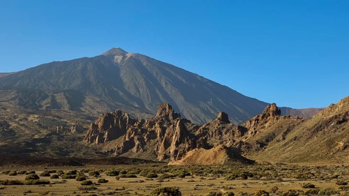 Llano de Ucanca, Teide volcano with rugged rocky landscapes in the foreground, Teide National Park,