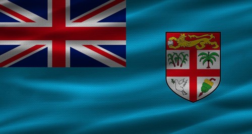Fijian flag with fabric texture. Realistic flag of Fiji waving
