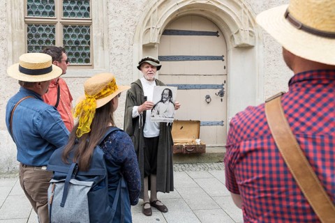 City tour with Philipp Melanchthon in historical costume in the old town, here in front of the