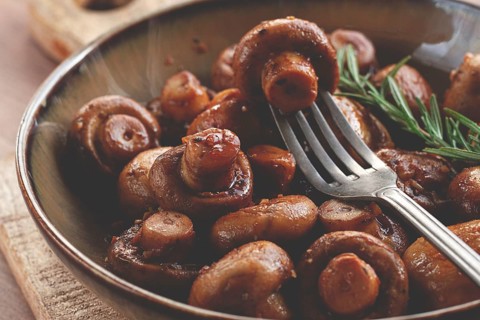 Fried mushrooms, with spices, in soy sauce, vegetarian food, homemade, no people