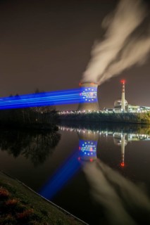 Protest action broadcast by the anti-nuclear organization, projection, night view, 05-03-2026,