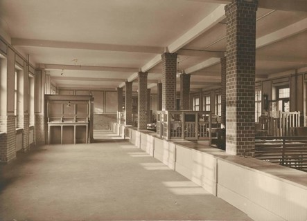 Kreuzberg post office, counter room, cash room, Berlin, large empty industrial space with brick