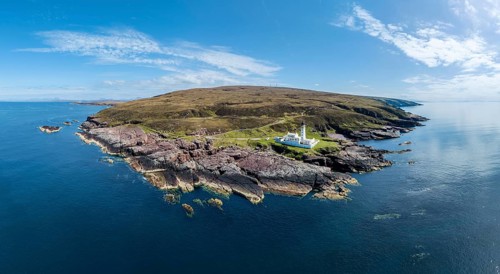 Aerial panorama photo of Rua Reidh Point Iighthouse at the rocky atlantic coast of northern