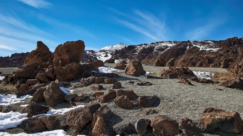 Snowy rocks in front of a mountain under clear sky, Teide, Parque Nacional del Teide, Teide
