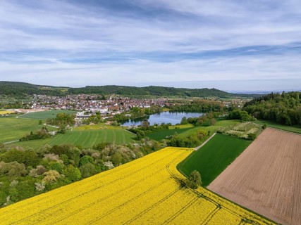 Aerial view of the municipality of Steisslingen in Hegau with Lake Steisslingen, in the foreground