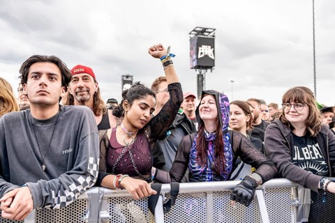 Festival visitors dance during Tom Morello's performance at Rock im Park on Zeppelin Field in