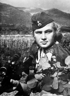 Portrait of an unknown female Red Army soldier. Southern Russia, 1943 J. Chaldej about the female