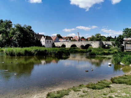 View over the Wörnitz and the old Wörnitz bridge to the town of Harburg, Donau-Ries district,