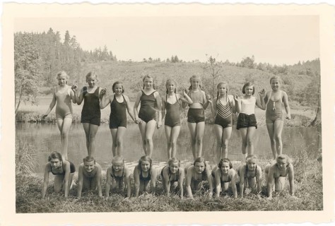 Bathing, swimwear, leisure, summer, girls in bathing suits posing together in two rows at a lake,