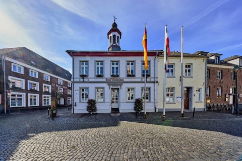 Town Hall, Old Town, Historic City Center, Historic Buildings, Street, Flag Poles with Flags,