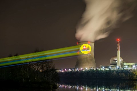 Protest action broadcast by the anti-nuclear organization, projection, night view, 05-03-2026,