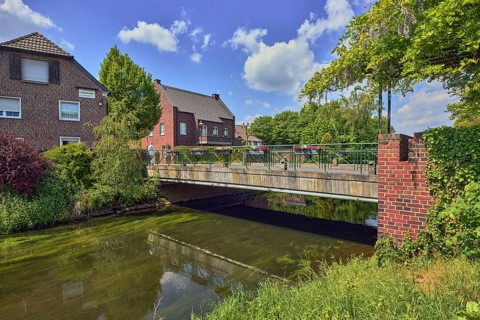 Niers river, general development, residential building, car bridge and footbridge, riverbank,