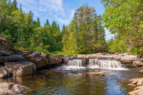 View of a waterfall and the surrounding nature, Telemark, Norway