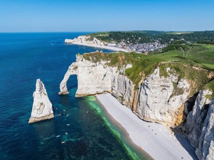 Aerial view of the Porte d'Aval rock formation, a tourist attraction on the chalk coast with the
