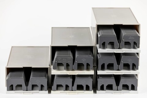Six boxes for slides in a staircase-like structure