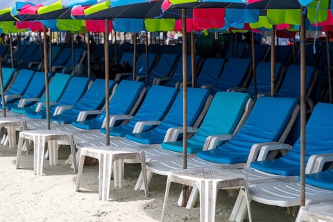 Sun loungers and umbrellas, Koh Larn, Thailand