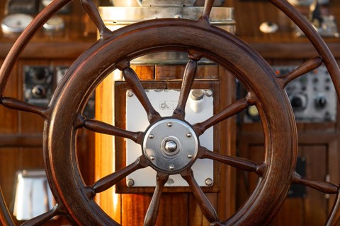 Detail of a teak steering wheel on a sailing ship, Aeolian or Aeolian Islands, Sicily, Southern