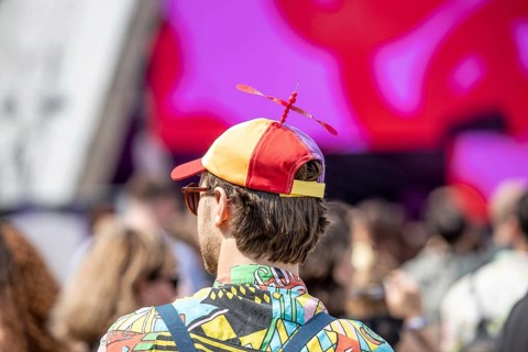 Festival goer wears a cap with propeller at the Lollapalooza Festival on the Olympic Site, Berlin,