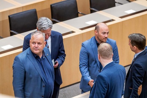 Parliamentarians from the AfD parliamentary group talking in plenary session. Left AfD MP Sandro