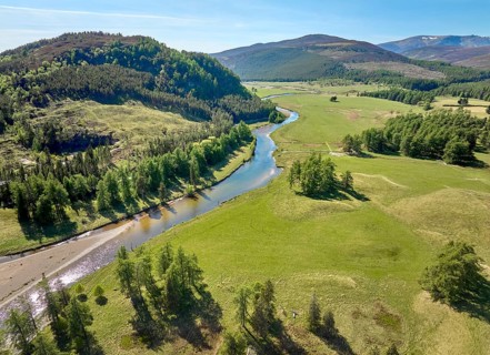 Aerial drone view of the course of Clunie River near Braemar, Cairn Gorms national Park, Scotland,