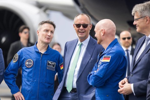 Friedrich Merz (Chancellor of the Federal Republic of Germany, CDU, wearing sunglasses) chats with
