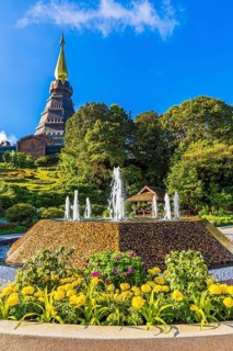 Blooming garden with fountain in front of the royal pagoda, Doi Inthanon National Park, Chiang Mai