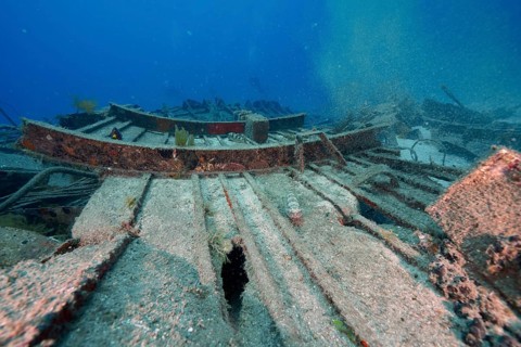 Dilapidated wreck in the sea on sandy ground, meteor wreck dive site, Russian hydrofoil boat,