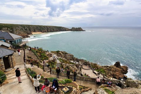 Tourists at the Minack Theatre, The Minack, rocky cliff overlooking the stage and sea, coastline,