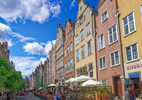 Historic buildings and outdoor restaurants on Piwna Street in the old town of Gdansk, former