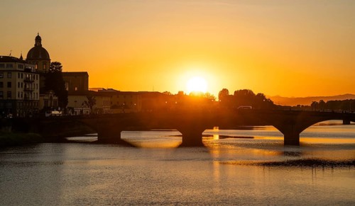 Sunset over an Arno bridge, old town, Florence, Tuscany, Italy