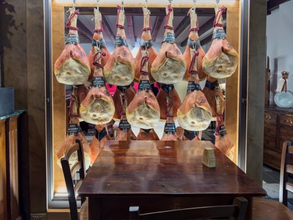 San Daniele ham hung in the restaurant La Tavernaccia Hosteria l'Altra Campana Prosciutteria local