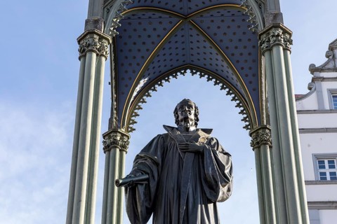 Monument to Philipp Melanchthon on the market square in front of the town hall, Luther city