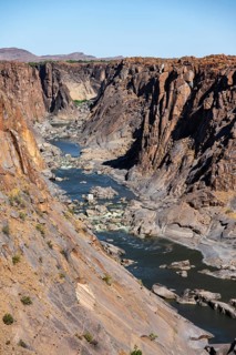 River bed and dump on the Orange River, Augrabies Falls National Park, Northern Cape, South Africa
