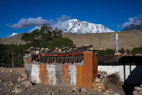 Buddhist prayer wheels and manistones, Tsarang, Mustang, Upper Mustang, Himalayas, Nepal
