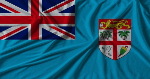 Fiji flag with fabric texture background. National flag of Fiji with cloth texture