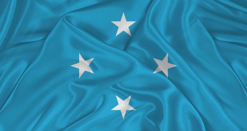 Micronesian flag with fabric texture. Realistic flag of Micronesia waving, National flag