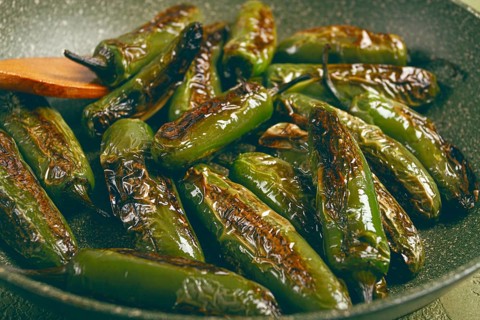 Fried padron pepper, in a frying pan, with olive oil, and sea salt, homemade, no people