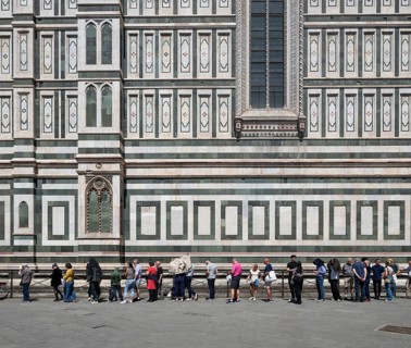 Mass tourism, overtourism, waiting in front of Santa Maria del Fiore Cathedral, Duomo by Filippo