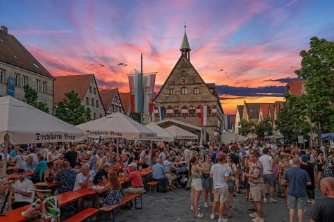 Evening sky at the Laufer city festival on the market square, in the back the Old Town Hall, Lauf