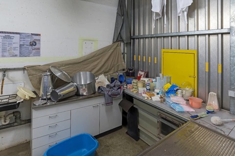 Kitchen with hygiene equipment in a disused nuclear bunker, built for 2, 400 people in the 1970s