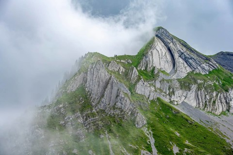 Dramatic mountain landscape with clouds, Ars mountain summit, near Suls-Lobhornhütte, Bernese Alps,